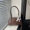 Bolso de Hombro Único Retro Simple de Moda Diseño de Nicho Casual para Mujer 2026 Nuevo Estilo de Primavera Bolso Personalizado para Debajo del Brazo