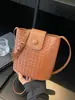 Bolsa de Palha Tecida de Luxo para Mulheres 2026 Novo Estilo Coreano Moda Versátil Bolsa de Ombro Bolsa Transversal de Nicho