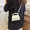 Bolsa de sela texturizada vintage da moda feminina, nova moda verão 2024, bolsa casual com axila, bolsa transversal