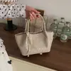 Bolsa de Palha Trançada de Luxo para Mulheres 2026 Novo Estilo Coreano Bolsa de Ombro Transversal para o Dia a Dia Elegante e Moderna Bolsa Prateada para Mulheres