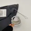 Bolso Brillante de Gama Alta para Mujer 2026 Primavera Nuevo Bolso de Hombro para el Trabajo Moda Simple Nicho Bolso Cruzado de Hombro Único