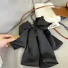 Horquilla para el pelo con lazo grande y elegante de color negro para mujer, con medio agarre y clip de tiburón de alta calidad.