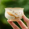 Taza de Té Naranja Gato Atrae Fortuna con Esmalte Beige Cerámica Taza de Maestro Taza Individual Juego de Té Kung Fu de Gama Alta Taza de Degustación Taza de Té