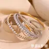 Moda Europea y Americana Diseño Elegante de Nicho Pulsera de Alta Gama Acero Inoxidable Chapado en Oro de 18K Pulsera Creativa Elástica de Circonitas