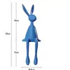 Adorno de conejo de orejas largas de dibujos animados famoso en internet para mueble de TV de sala de estar, recepción de hotel y decoración de mesa.