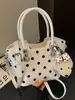 Colección de otoño 2026 transfronteriza: bolso de mano con diseño de puntos múltiples, bolso de hombro, bolso tipo cubo, bolso para el trabajo, bolso casual versátil