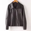 Chaqueta corta de cuero para mujer Haining con cuello de solapa y cinturón de corbata, nuevo estilo otoño e invierno 2026, elegante abrigo de piel de oveja, talla grande moderno