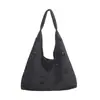Bolsa de Ombro Feminina Recorte Retro Coreana Outono e Inverno 2025 Nova Bolsa Tote para o Trabalho Bolsa de Mão Casual em Camurça