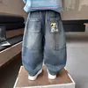 Pantalones de niño primavera jeans 2026 nuevo modelo de primavera estilo coreano para niños jeans rectos holgados pantalones largos para bebé