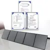 Panel solar plegable 100W Cargador USB Carga exterior Placa de generación de energía portátil Esencial para camping y viajes