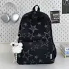 Mochila de estilo minimalista de alta gama con estampado de estrellas en tonos oscuros, refrescante y juvenil estilo americano, adecuada para estudiantes para la escuela y salidas, mochila escolar moderna y genial