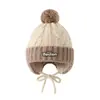 Gorro de punto con bloques de color para niños para otoño e invierno, con protección para las orejas y pompón grande, gorro de lana tipo Boston para niños y niñas