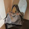 Bolso tote de gran capacidad para mujer, nuevo bolso de hombro versátil de moda vintage, bolso tote de alta gama para el día a día
