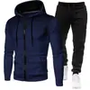 Colección Otoño/Invierno 2026: Sudadera deportiva unisex de lunares con forro polar, conjunto de sudadera con cremallera y pantalones de chándal de color liso para hombre