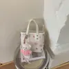Bolso de mano para mujer para salir, nuevo modelo primavera-verano 2026, de alta gama, moderno, versátil, de un solo hombro, bandolera tipo cubo