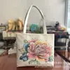 Bolso de hombro con patrón floral de hilo dorado para sofá de nuevo estilo, bolso tote de gran capacidad, bolso de lona, bolso de mano para compras, cierre de una sola cremallera, ribete blanco