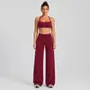 Conjunto de roupa fitness transfronteiriço, com um design traseiro estiloso, um top esportivo de gola halter e calças de yoga de secagem rápida, adequado para corrida ao ar livre, ciclismo e Pilates.