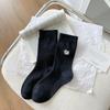 Calcetines de gato negro con bordado de dibujos animados versión coreana de principios de primavera 2025 al por mayor transpirables Joker algodón fino calcetines de mujer