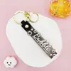 Llavero Colgante de Cordón de Cuero con Letra Transparente Brillante con Accesorios Estilo Muñeca Rellena de Aceite Encanto de Llavero Pulsera Venta al por Mayor
