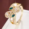 Anel Oco Inlaid com Zircônia em Forma de Folha Gota d'Água Estilo 2026, Joia Anel Feminino de Cobre Puro Versátil de Alta Qualidade Atacado
