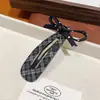 Presilha BB Xadrez Retro com Laço para Mulheres Estilo Coreano Presilha Lateral de Pressão Simples para Franja e Cabelos Rebeldes Acessório de Cabelo Versátil em Tecido