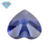 Huagang gema agujero único medio en forma de corazón circón azul Tan sang piedra desnuda al por mayor gema sintética artificial Tan Sang Lan