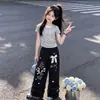 2026 Conjunto de Tendencia de Moda Verano Nuevo Estilo Coreano Manga Corta Lazo Dulce Encaje Pantalones de Pierna Ancha Conjunto de Dos Piezas
