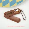 Nuevo Peine Plegable Lindo de Dibujos Animados Mini Peine para Estudiantes con Cadena Colgante Peine de Bolsillo Portátil Peine de Peluquería Venta al por Mayor