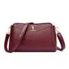 Bolsa Feminina 2024 Primavera Nova Chegada Bolsa de Ombro Transversal Grande Capacidade Multicamadas Bolsa para Mulheres de Meia-idade Versátil Simples