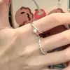 Diseño de nicho anillo fino de perla de alta calidad tendencia de personalidad de moda anillo para el dedo índice versátil anillo abierto de estilo frío