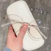 Nuevos Armazones para Gafas Retro Redondos de Metal Liso Artístico Ultraligeros Danyang Wholesale para Mujer de Gama Alta, Se Pueden Montar con Lentes Graduados