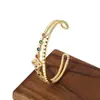 Pulseira de camada dupla de luxo leve da moda transfronteiriça, pulseira de trevo de quatro folhas com zircônio incrustado de cobre, pulseira popular na Amazon para mulheres, atacado