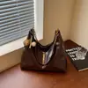 Bolso de Hombro Tipo Empanada de Gran Capacidad Transfronterizo para Mujer 2026 Nuevo Estilo Lujo Ligero Nicho Gama Alta Versátil para Viajes