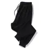 Calça de moletom esportiva de veludo cotelê com forro de fleece para homens, espessa para aquecer no inverno, modelagem solta, versátil, plus size, calça longa casual com punho