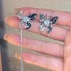 Viento Frío Diamantes Incrustados Borla de Mariposa Líquida Clip Asimétrico para Hueso de la Oreja Pendientes de Diseño Nicho Super Hada