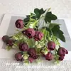 Ramo de 18 capullos pequeños de flores artificiales comercio exterior estilo ins boda auditorio arreglo floral para el hogar accesorios de ventana floral flores artificiales