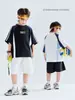 Ropa para Niños Camiseta de Manga Corta de Algodón Puro para Niños Estilo Nuevo Verano 2026 Tops con Parches de Color Contrastante para Niños Ropa de Media Manga de Verano para Niños Grandes