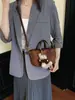 Colección de otoño transfronteriza nueva: bolso de hombro retro de gamuza para mujer, un bolso cruzado o de mano elegante y discreto para el día a día