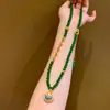 Acessórios de Moeda de Jade Chinês Novos de Outono Pingente Ruyi Borla de Orquídea Corrente de Suéter de Ouro Antigo Colar Feminino
