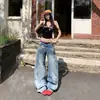 Pantalones de Mezclilla de Pierna Ancha de Cintura Baja Retro Americano Desgastado Versátiles Sueltos Adelgazantes con Corte Curvo para Mujer, Nueva Tendencia Verano 2026