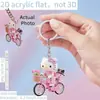 Chaveiro Acrílico Plano 2D Transfronteiriço com Hello Kitty Andando de Moto, Chaveiro Prático, Bonito e Inovador