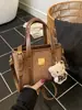 Bolso Tote de Lujo de Nicho para Mujer 2025 Nuevo Bolso de Mano Bolso Cruzado al Hombro Bolso Cubo Un Solo Hombro Cruzado Elegante