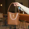 Bolsa de Mão de Moda de Luxo Feminina 2024 Nova Vintage Simples Trava Saco de Balde Nicho Transversal Bolsa de Ombro