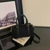 Bolsa Boston nicho nova bolsa de mão tipo camurça travesseiro para o trabalho retrô 2026 bolsa transversal para mulheres design