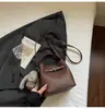 Bolso Cubo Simple y Elegante para Mujer 2026 Nuevo Bolso de Hombro Retro de Nicho Bolso Cruzado Casual para el Día a Día