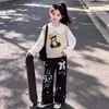 Conjunto casual de primavera y otoño para niñas: incluye un chaleco, una camisa de mezclilla con cuello de muñeca y un par de pantalones de pierna ancha con ribete de encaje - un conjunto de dos piezas para niñas mayores