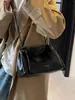 Bolsa Retro Elegante de Grande Capacidade para o Dia a Dia de Mulheres 2026 Nova Corrente Moda Bolsa Tote Simples Bolsa de Ombro