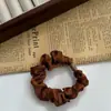 Estilo Coreano Simples Elástico Alto Cetim Intestino Delgado Elástico de Cabelo Cor Café com Leite Corda de Cabeça para Rabo de Cavalo Bola de Cabelo Durável e Não Prejudicial Corda de Cabelo