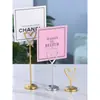 Creativo portanúmeros de mesa en forma de corazón de acero inoxidable, portatarjetas de mesa para hotel, boda, banquete, pinza para tarjetas de mesa, portatarjetas de presentación y portamenús