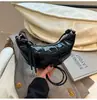 Bolso croissant coreano de nicho transfronterizo para mujer 2026 nuevo versátil casual super caliente bolso tipo empanada de moda bolso de hombro único cruzado